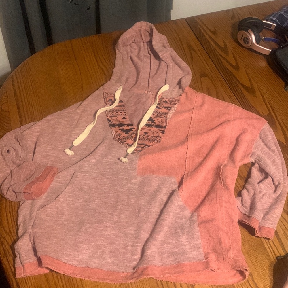 Size small but will easily fit a medium due to being oversized